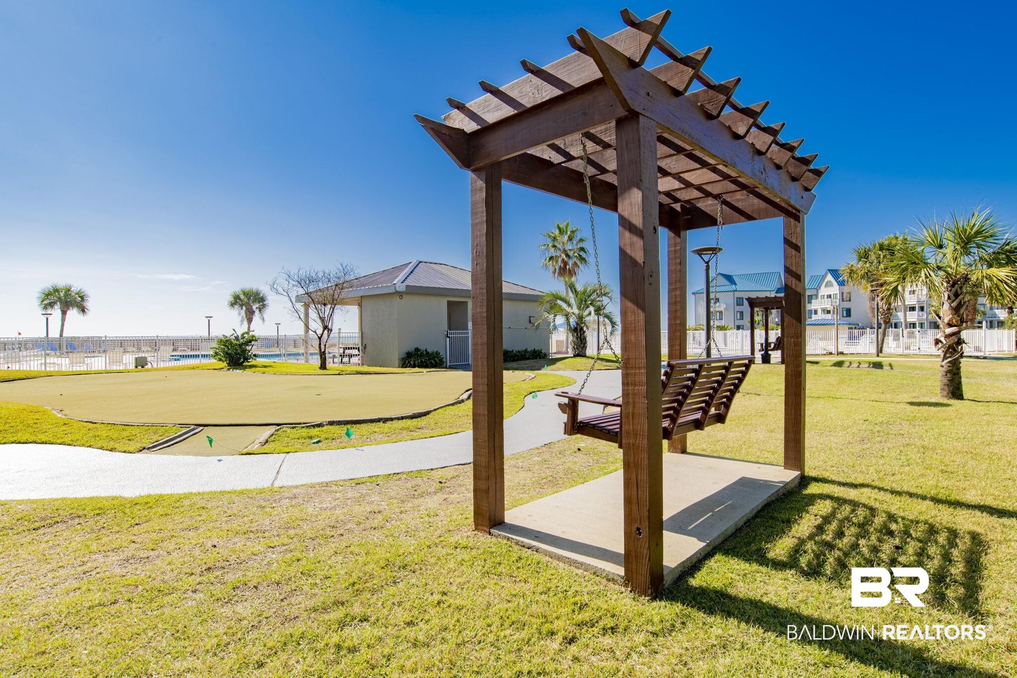 375 Plantation Road, Unit 5514 Gulf Shores, AL 36542 - Photo 32 of 44 View of grassy yard with a pergola
