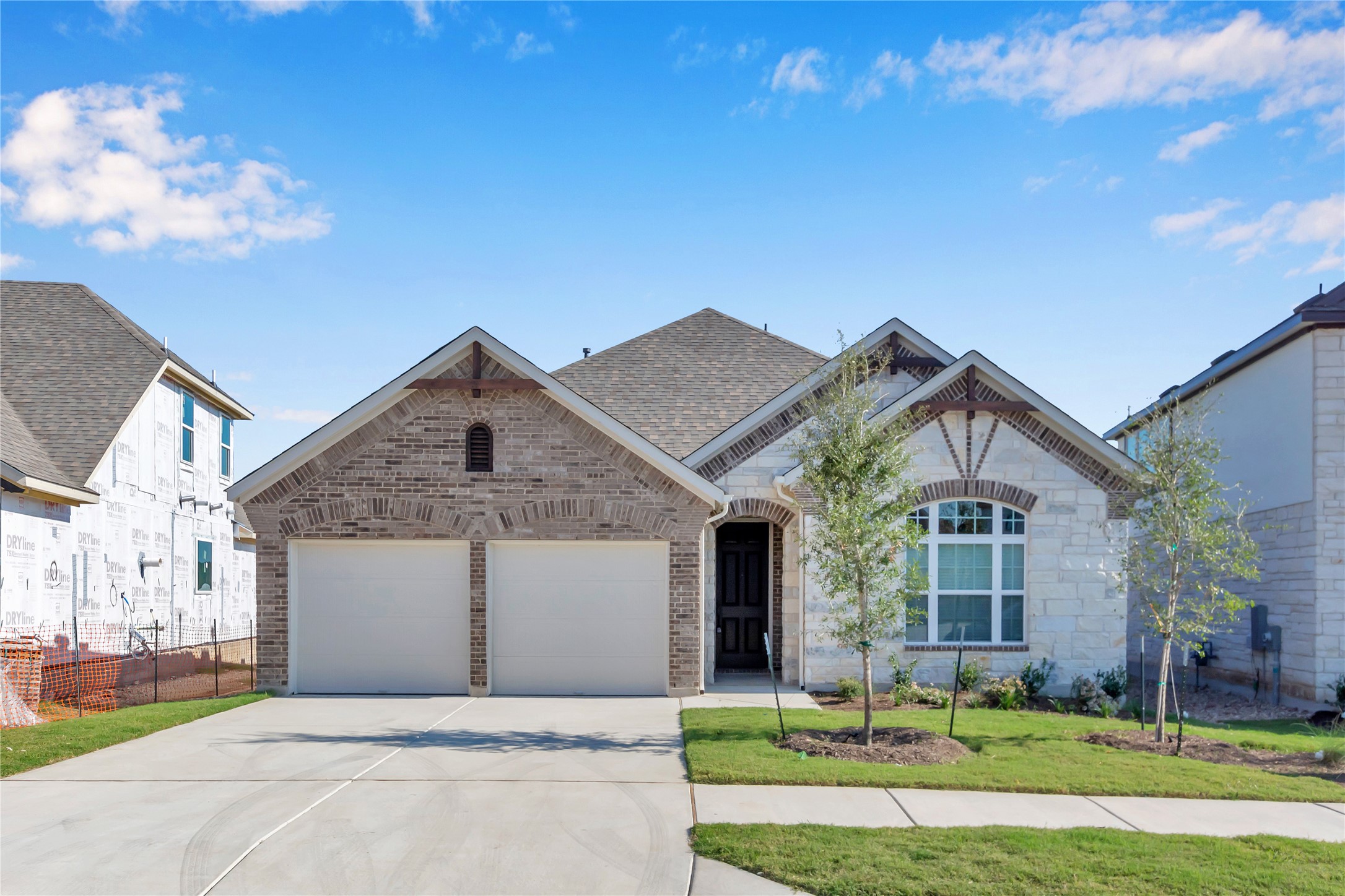 2140 Base Burner Path Leander, TX 78641 - Photo 1 of 27 a front view of a house with a yard and garage
