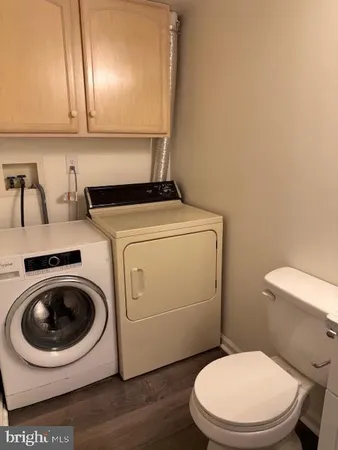 a bathroom with a toilet and a sink