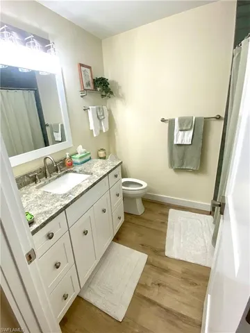 a bathroom with a shower and a bath tub