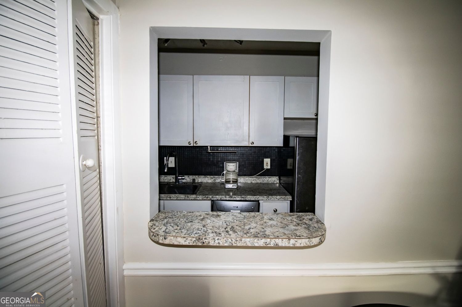 2805 Northeast Expressway Northeast, Unit C11 Atlanta, GA 30329 - Photo 11 of 14 a view of a bathroom with a sink
