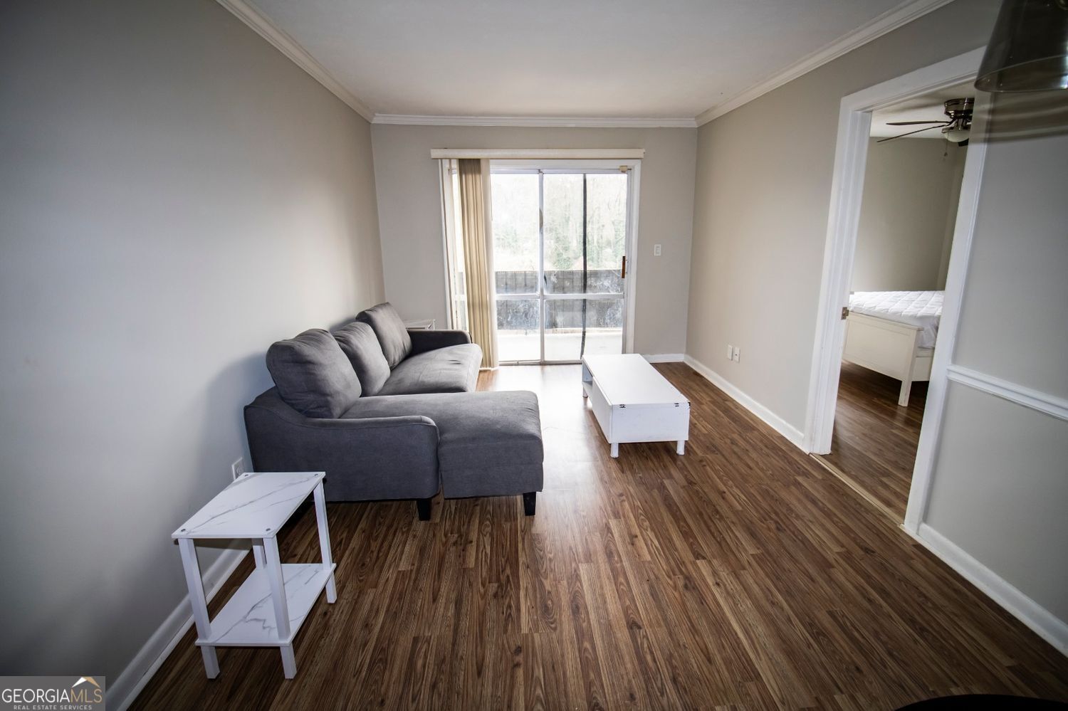 2805 Northeast Expressway Northeast, Unit C11 Atlanta, GA 30329 - Photo 5 of 14 a living room with furniture and a fireplace