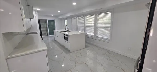 a bathroom with a shower and a toilet