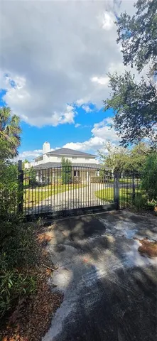 a view of a balcony with wooden floor