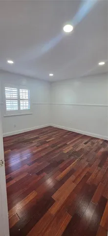 a view of a house with a plants and a window