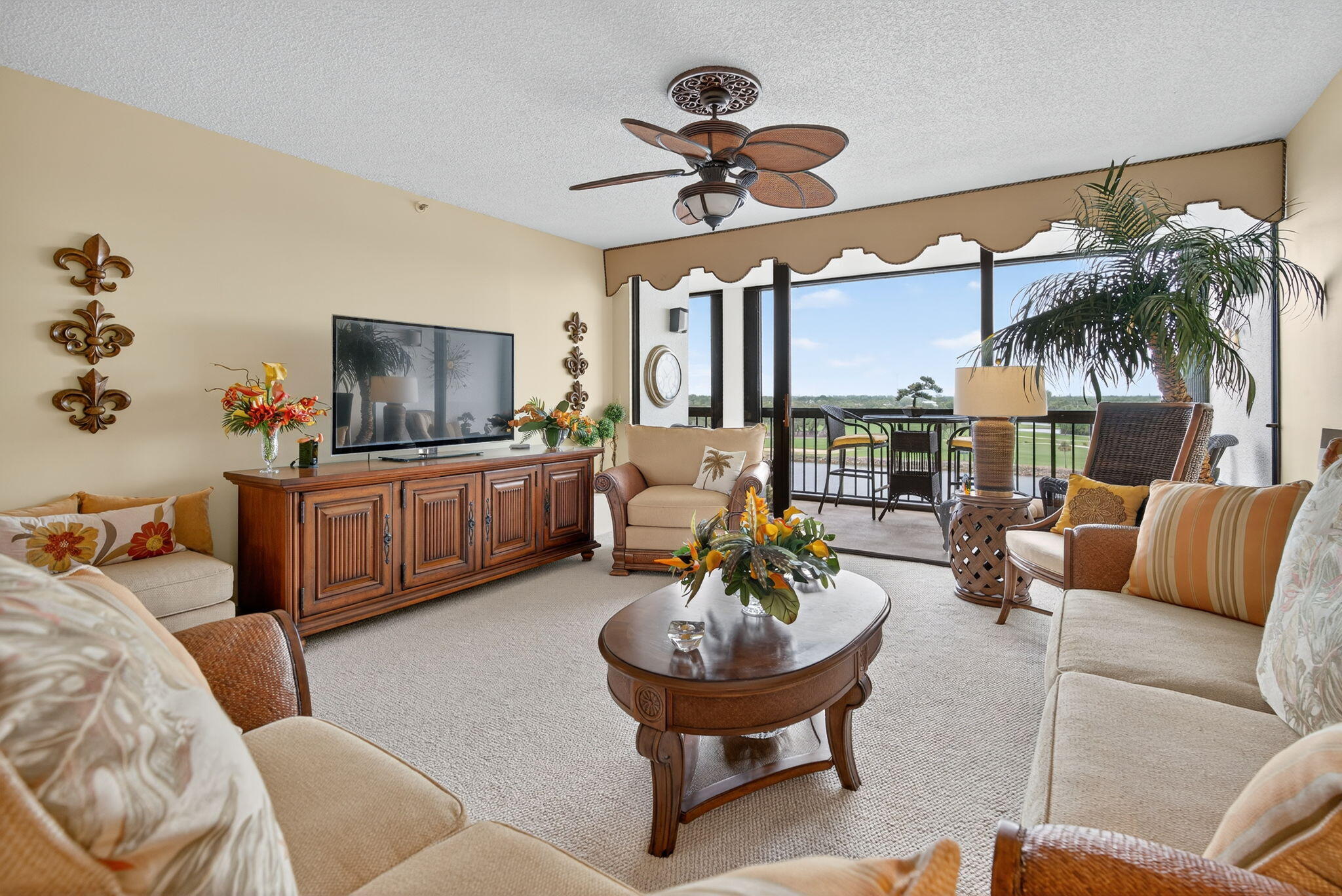 356 Golfview Road, Unit 609 North Palm Beach, FL 33408 - Photo 13 of 104 a living room with furniture and a flat screen tv