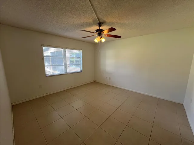 a view of a lake with houses in the background