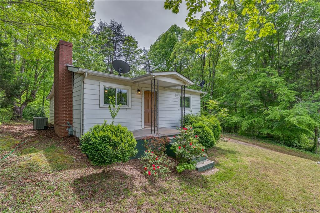 360 East 2nd Street Rutherfordton, NC 28139 - Photo 2 of 19 a front view of a house with garden