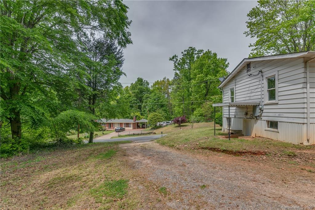 360 East 2nd Street Rutherfordton, NC 28139 - Photo 3 of 19 a view of a house with a yard and tree s