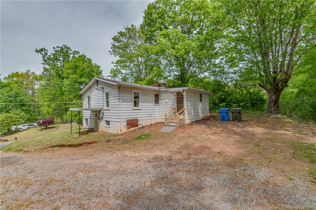 360 East 2nd Street Rutherfordton, NC 28139 - Photo 5 of 19 a view of a house with backyard and trees