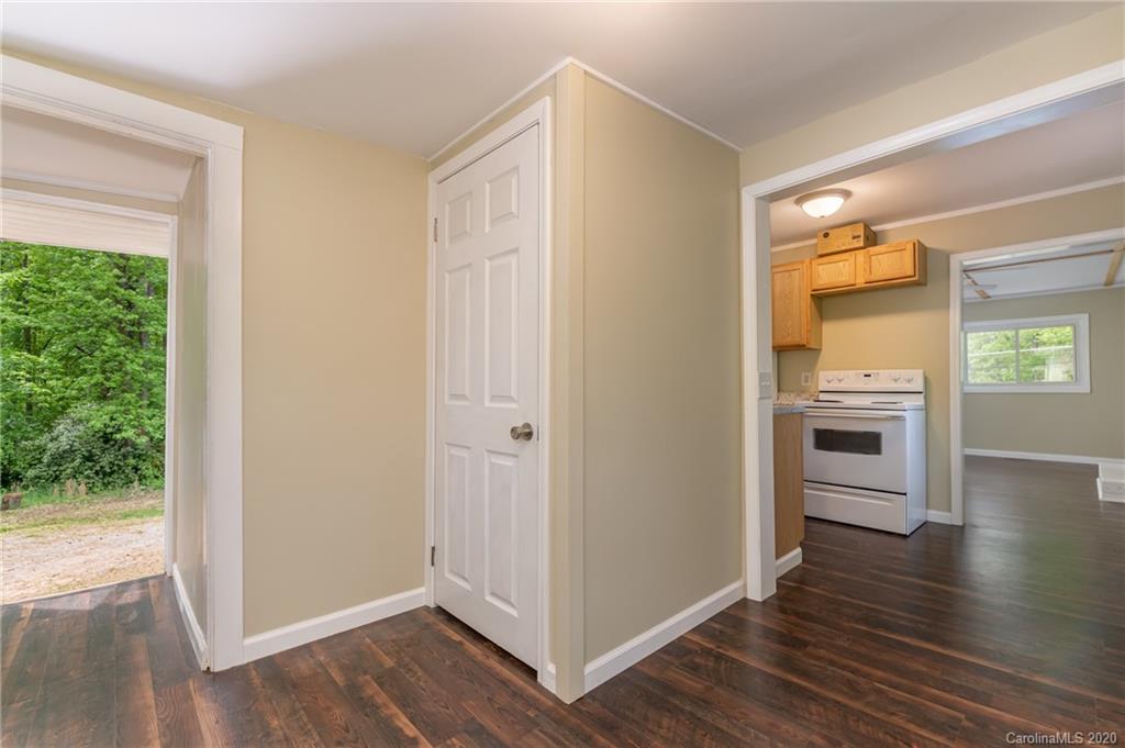 360 East 2nd Street Rutherfordton, NC 28139 - Photo 9 of 19 a view of a kitchen from an empty room and window