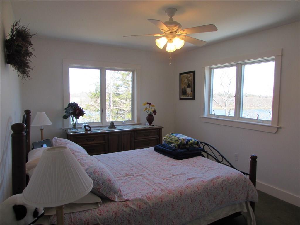 36 Hatch Cove Drive Castine, ME 04421 - Photo 19 of 28 One of two upstairs bed rooms