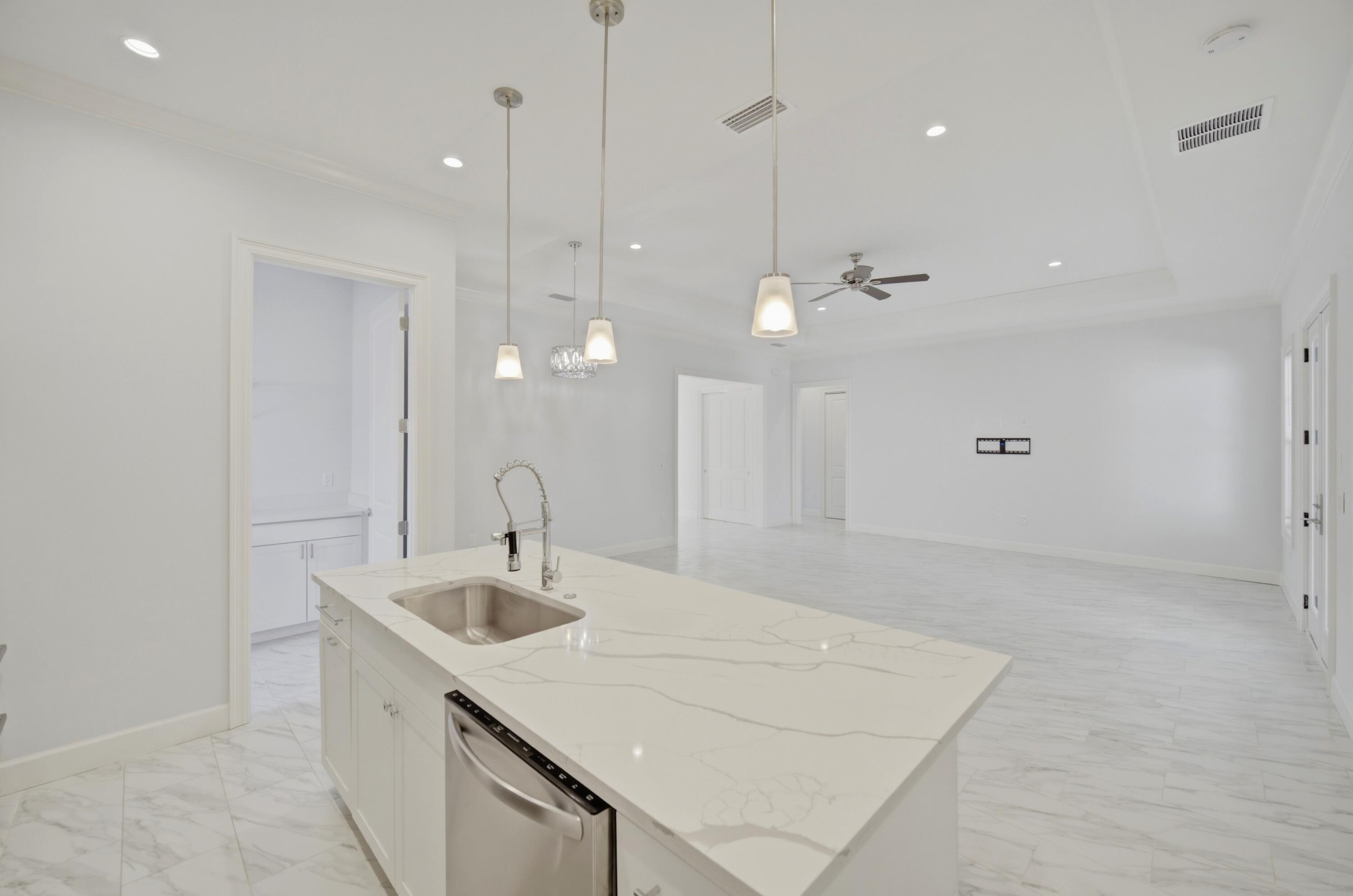 120 Lillian Way Crestview, FL 32536 - Photo 46 of 67 a bathroom with a sink a large mirror and vanity