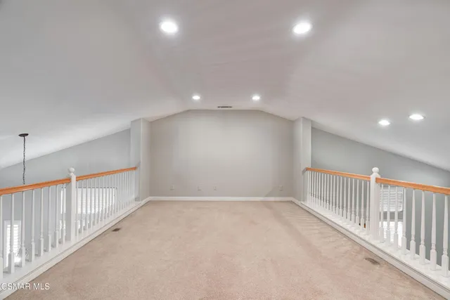 a view of hallway with stairs