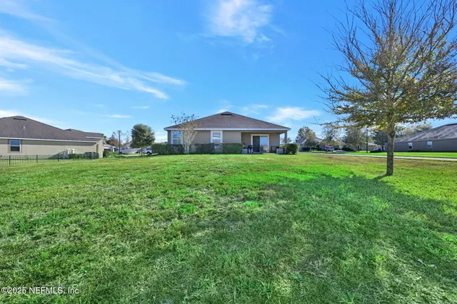 a house view with a garden space