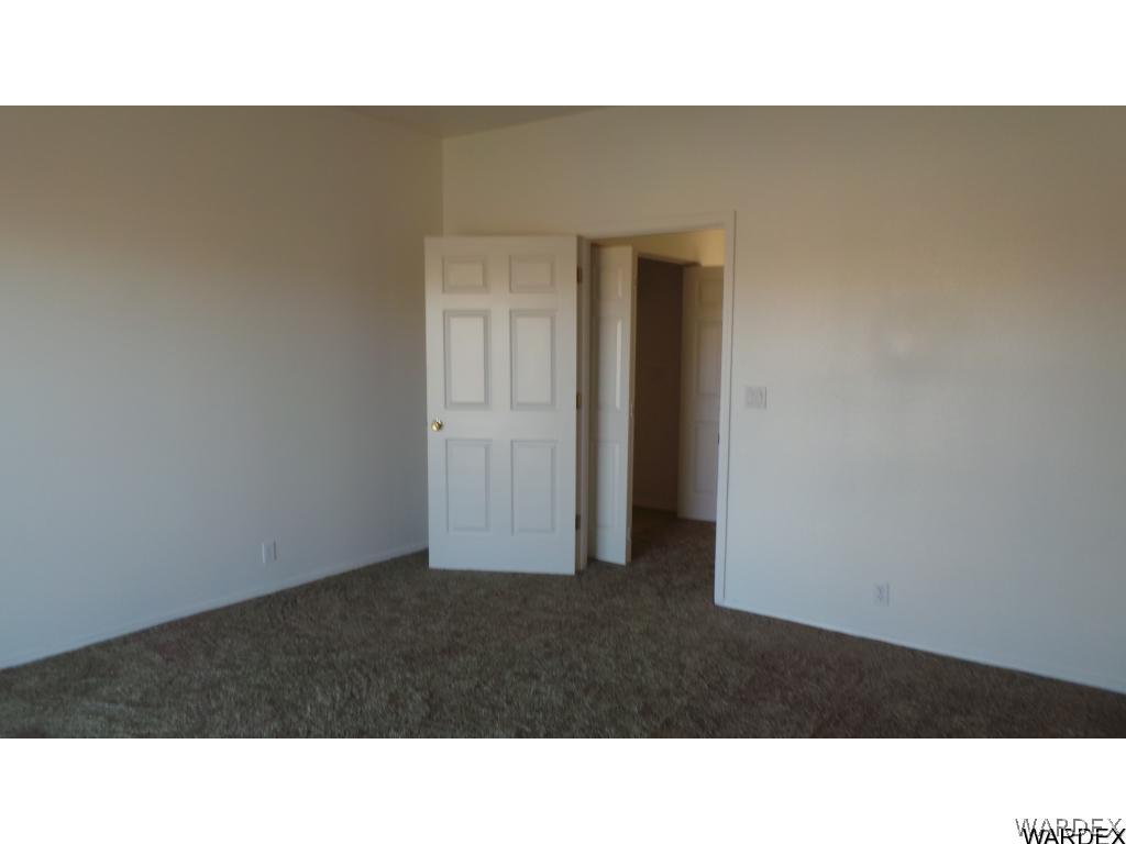 3661 Estrella Road Golden Valley, AZ 86413 - Photo 8 of 19 Spacious Master Bedroom