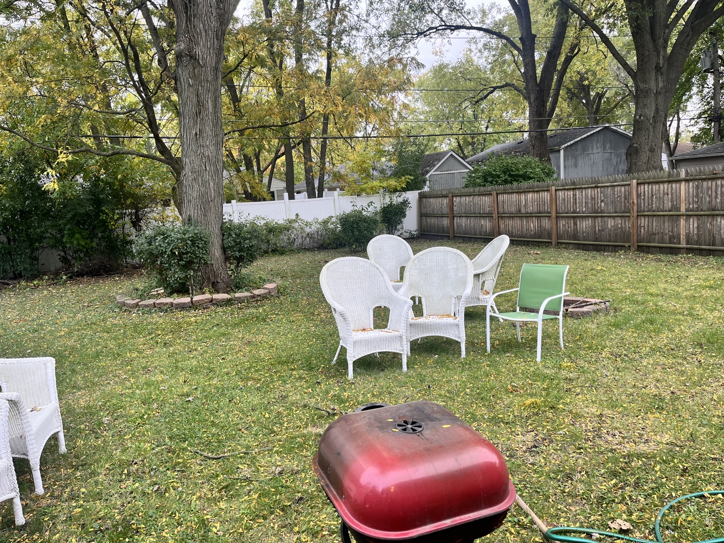 335 Manitowac Street Park Forest, IL 60466 - Photo 10 of 10 a view of a chairs and table in backyard
