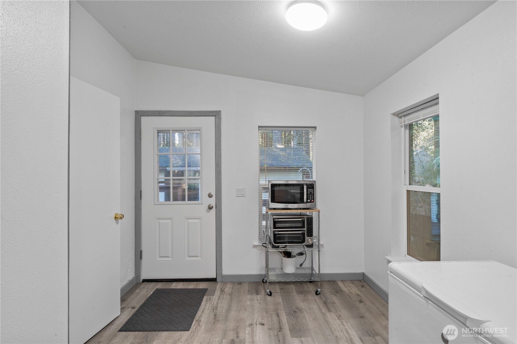 48 Robin Lane Pacific Beach, WA 98571 - Photo 11 of 36 wooden floor and closet in a room