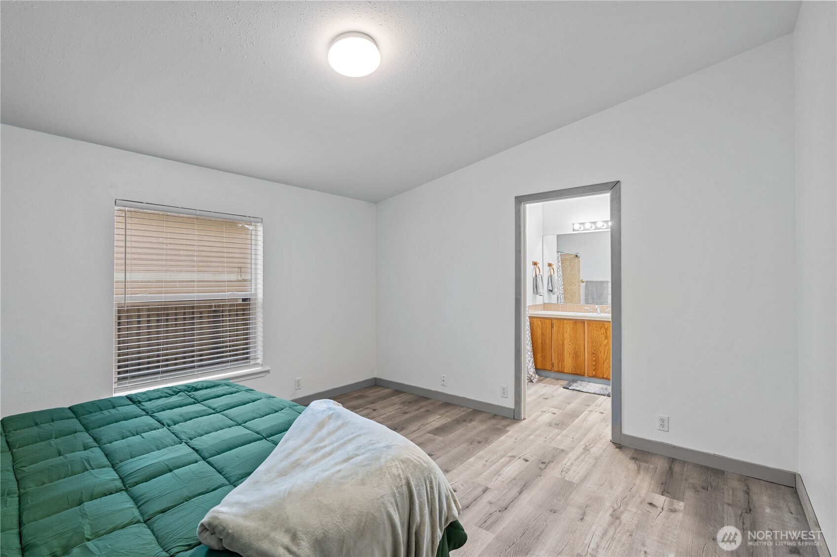 48 Robin Lane Pacific Beach, WA 98571 - Photo 14 of 36 a bedroom with a bed and a window