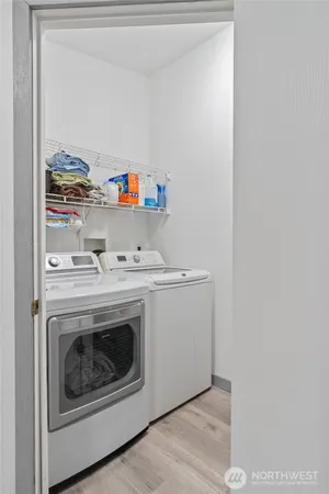 a utility room with washer and dryer