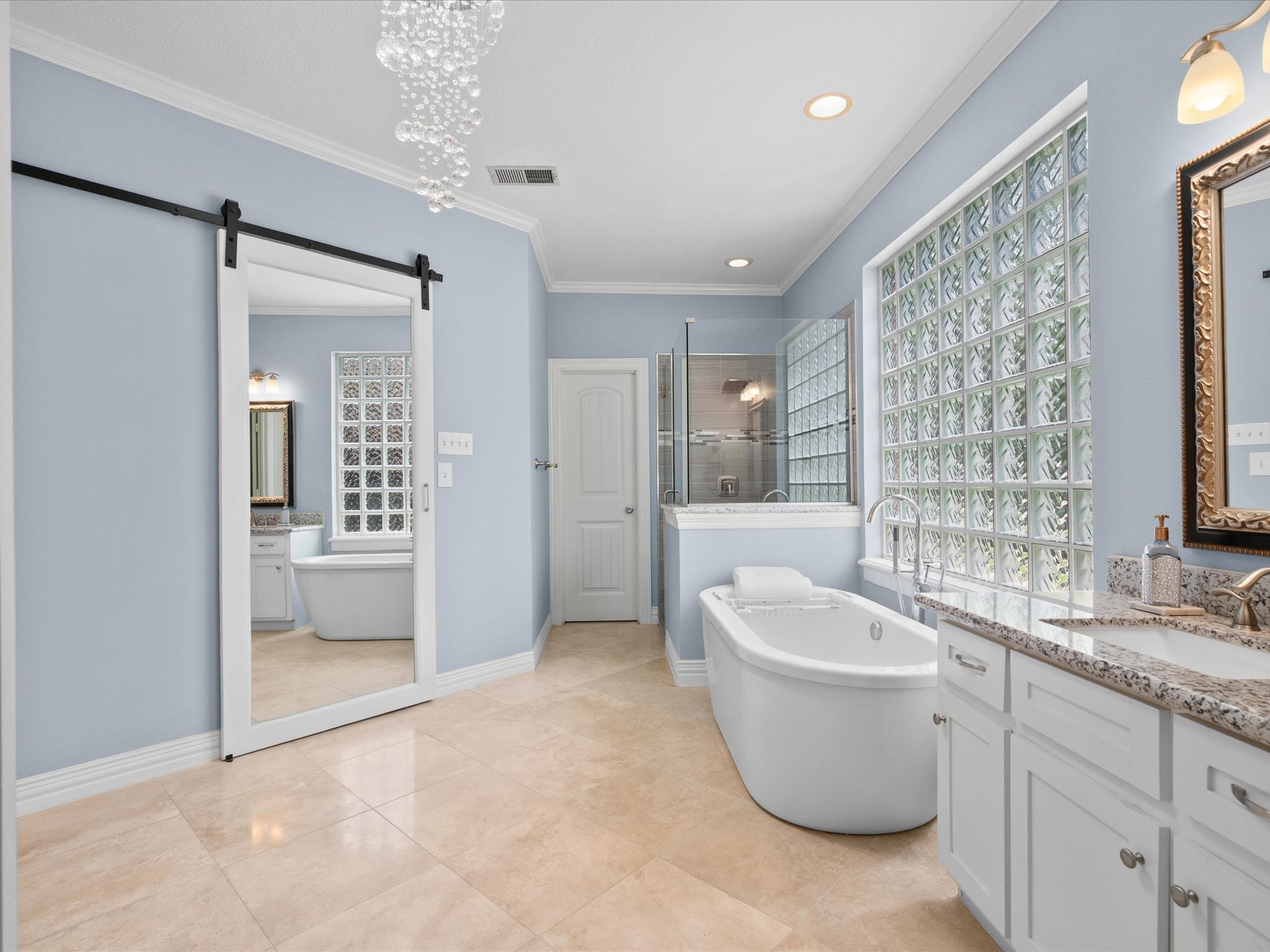 16123 Lafone Drive Spring, TX 77379 - Photo 20 of 47 Spacious and thoughtfully designed, the primary bath offers a spa-inspired experience with a generous soaking tub, separate shower, and dual vanities.