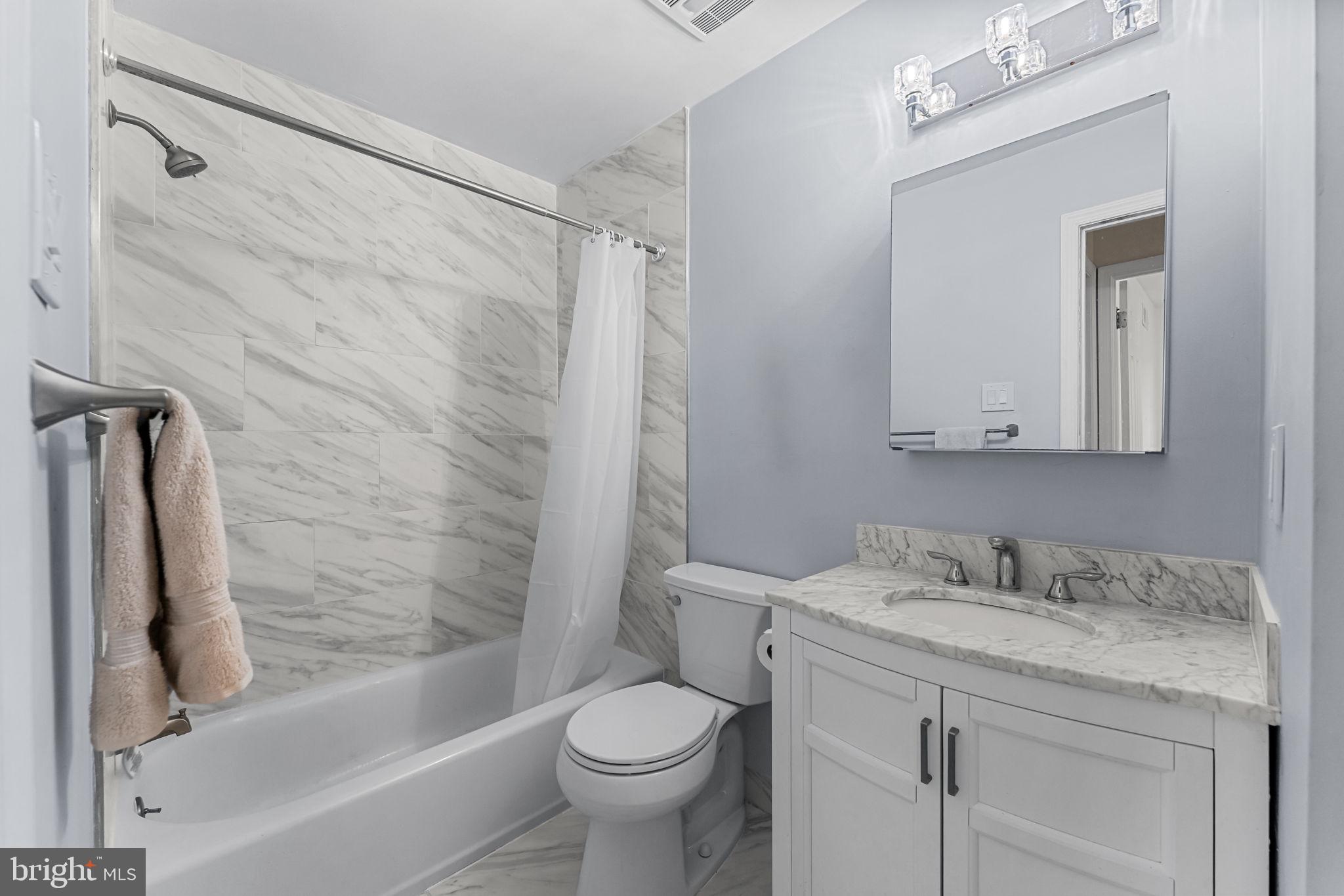 14 Elan Lane Chesterbrook, PA 19087 - Photo 24 of 31 updated full bath servicing bedrooms 2 and 3