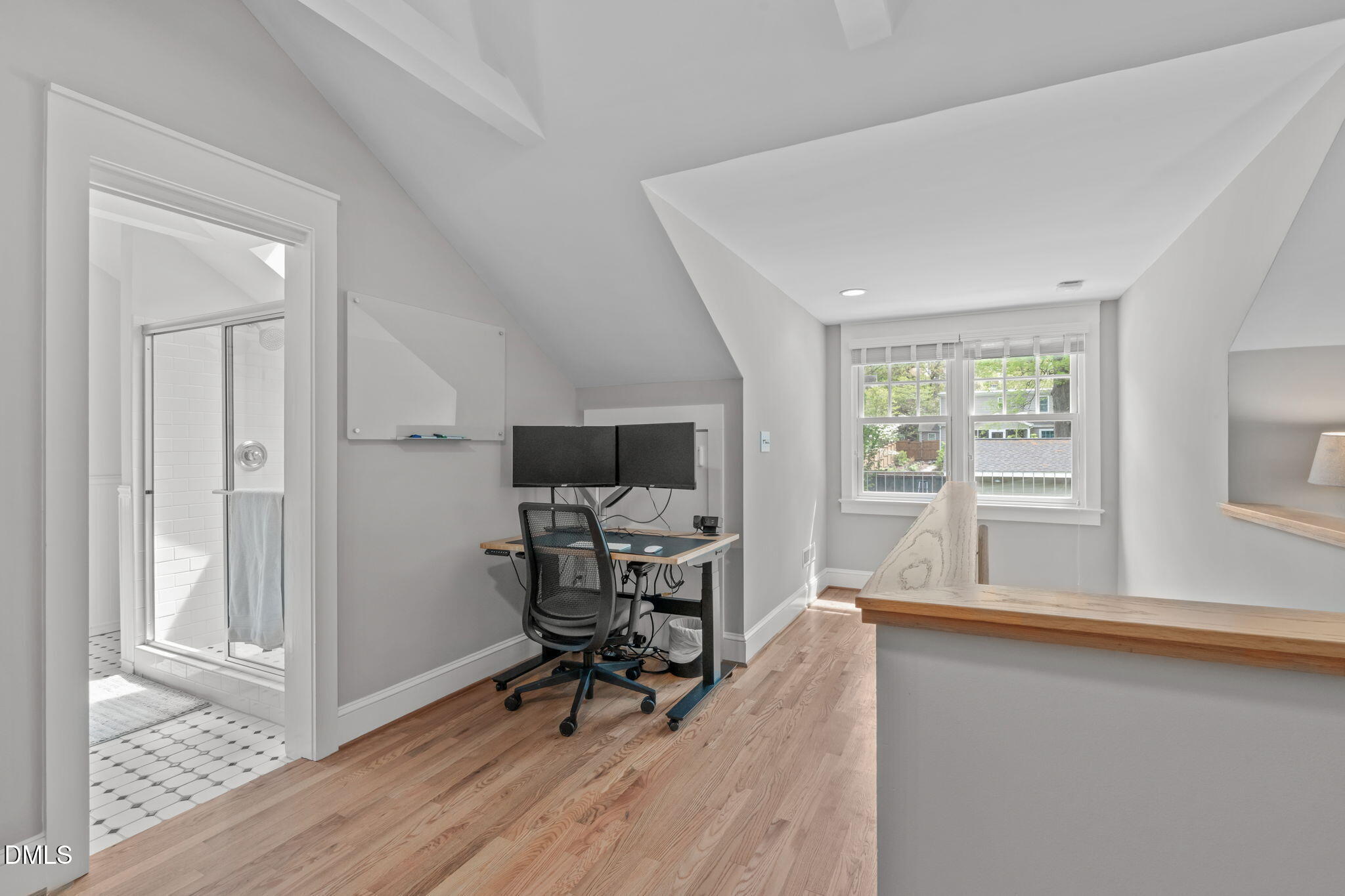 2111 Pershing Street Durham, NC 27705 - Photo 35 of 59 a workspace with wooden floor and a window