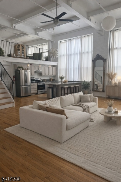 350 Scotland Road, Unit 105 Orange, NJ 07050 - Photo 4 of 17 a living room with furniture and kitchen view