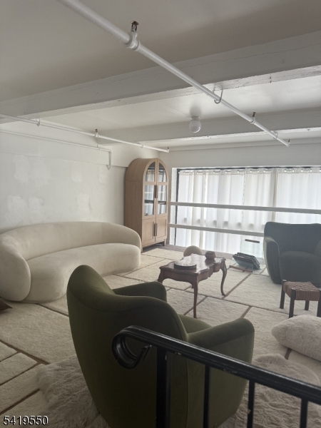 350 Scotland Road, Unit 105 Orange, NJ 07050 - Photo 5 of 17 a living room with furniture