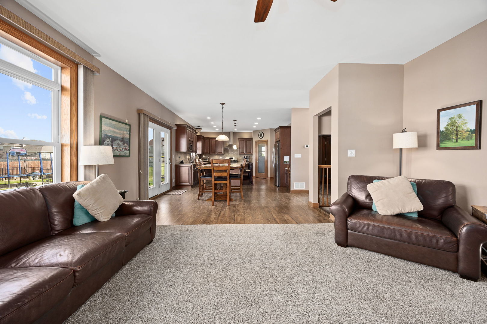 311 West Frontier Drive Minooka, IL 60447 - Photo 14 of 44 a living room with furniture and a large window