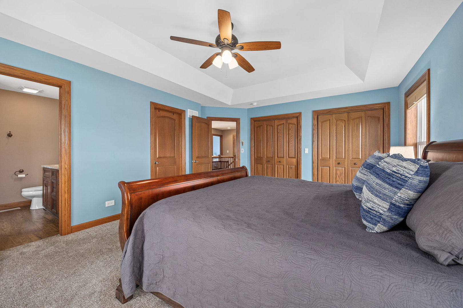 311 West Frontier Drive Minooka, IL 60447 - Photo 19 of 44 a bed room with a bed and a couch