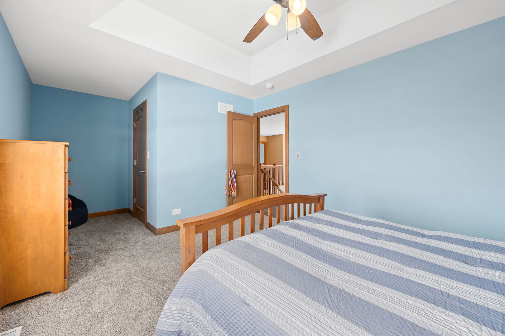 311 West Frontier Drive Minooka, IL 60447 - Photo 23 of 44 a bedroom with bed and a window