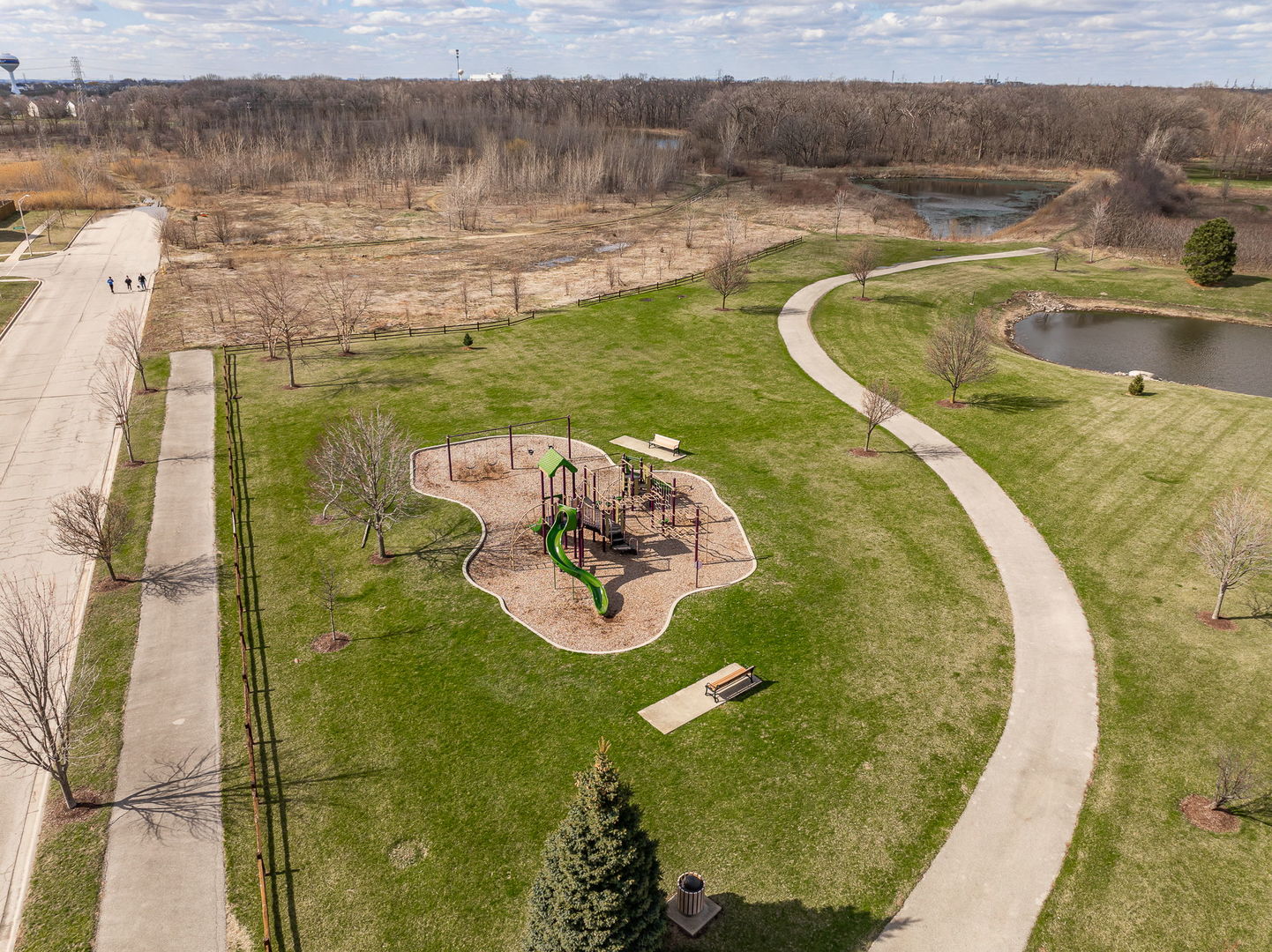 311 West Frontier Drive Minooka, IL 60447 - Photo 41 of 44 a view of a swimming pool with a lake view