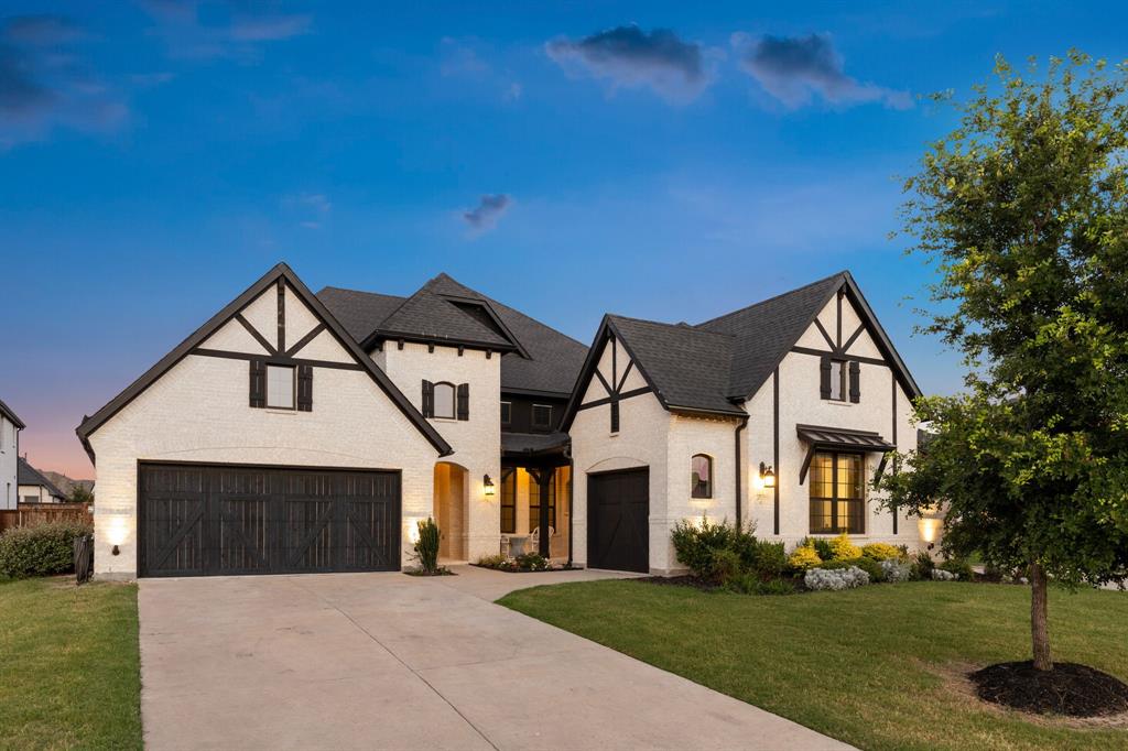 3508 Ruffian Court Celina, TX 75009 - Photo 2 of 38 a front view of a house with a yard and garage