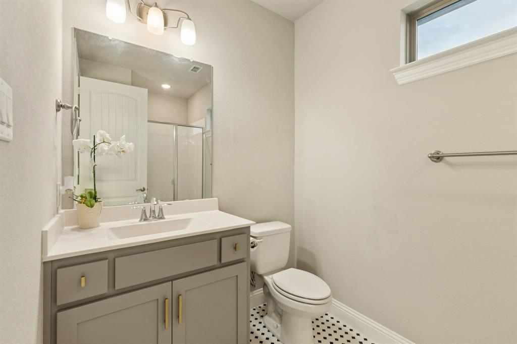 3508 Ruffian Court Celina, TX 75009 - Photo 27 of 38 a bathroom with a sink toilet and a mirror