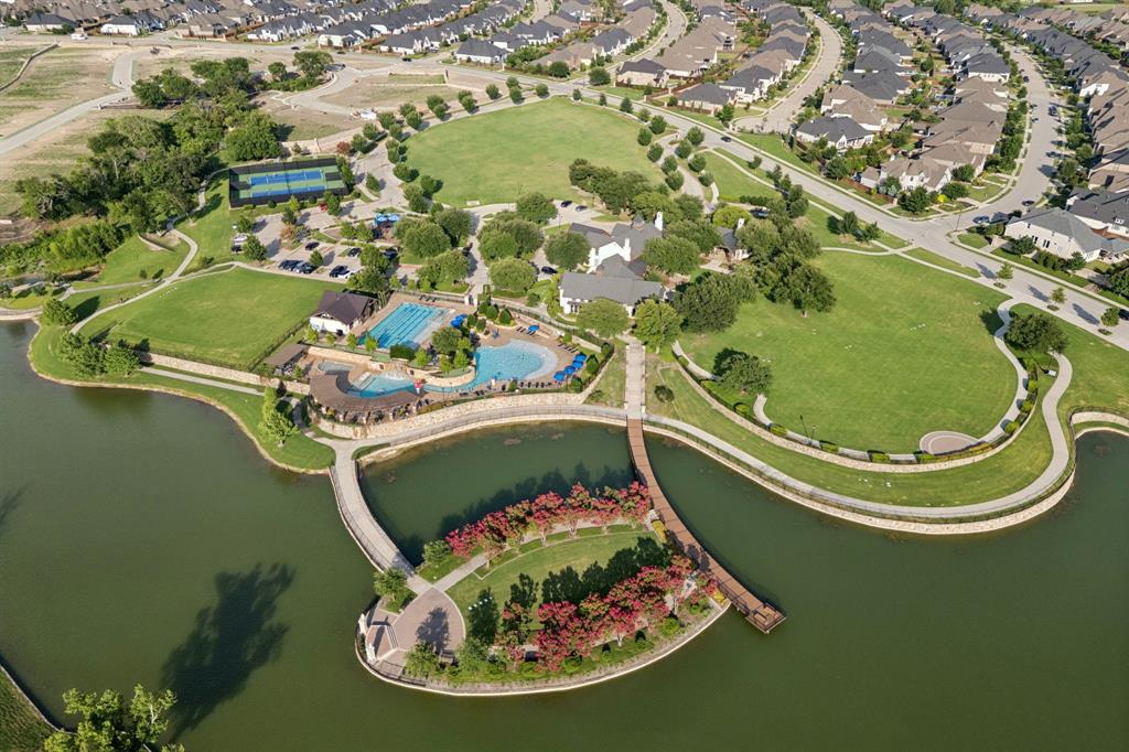 3508 Ruffian Court Celina, TX 75009 - Photo 31 of 38 an aerial view of a house with a lake view