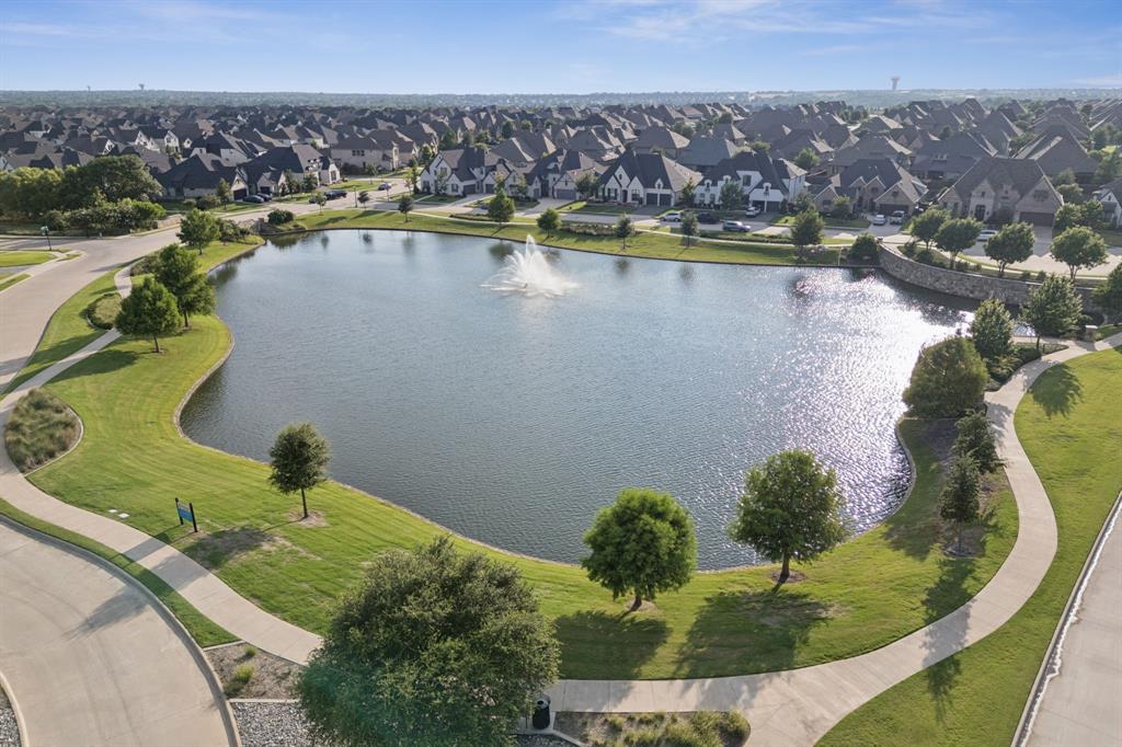 3508 Ruffian Court Celina, TX 75009 - Photo 35 of 38 an aerial view of a house with a lake view