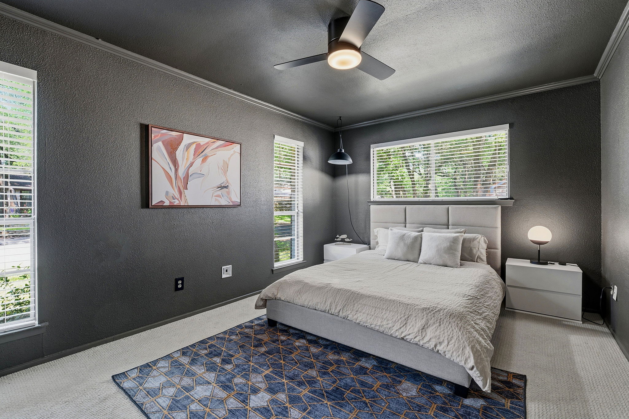 4705 Fieldstone Drive Austin, TX 78735 - Photo 19 of 34 a bedroom with a large bed and a window