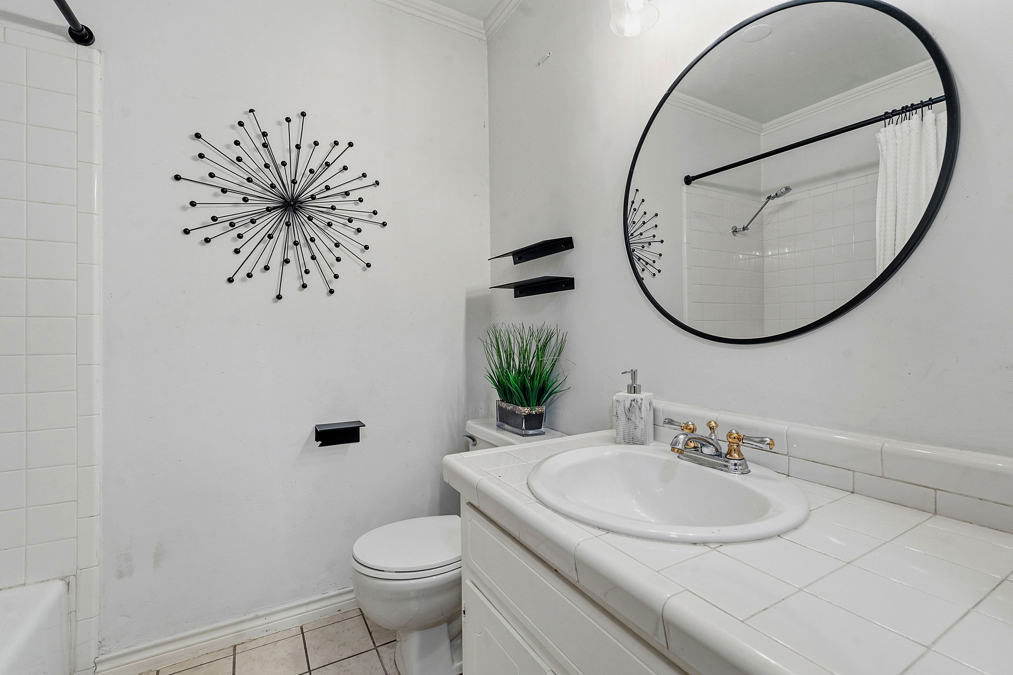 4705 Fieldstone Drive Austin, TX 78735 - Photo 20 of 34 a bathroom with a sink mirror and toilet