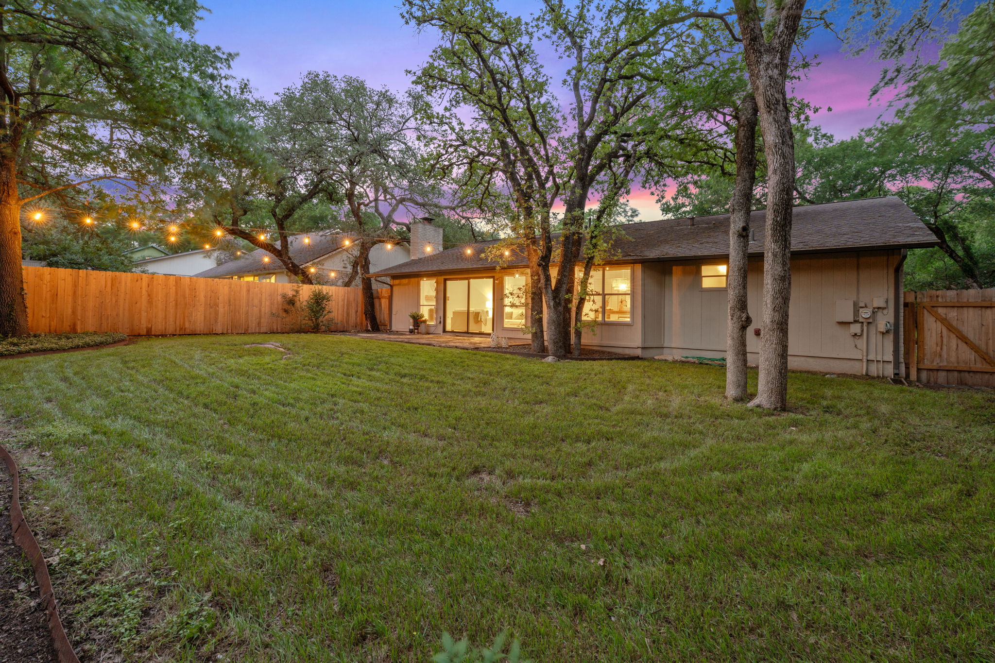 4705 Fieldstone Drive Austin, TX 78735 - Photo 29 of 34 front view of a house with a big yard