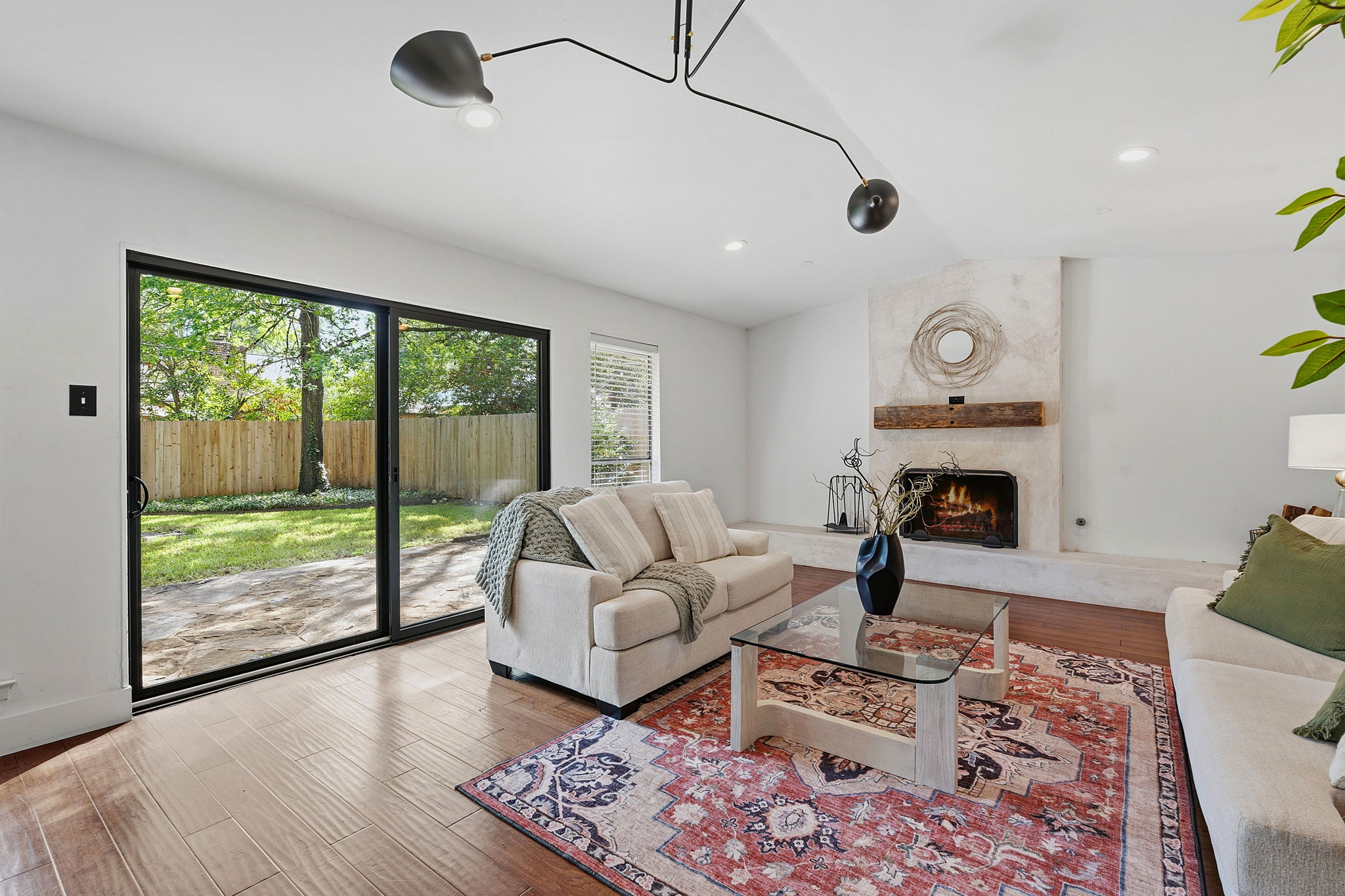4705 Fieldstone Drive Austin, TX 78735 - Photo 6 of 34 a living room with furniture and a fireplace