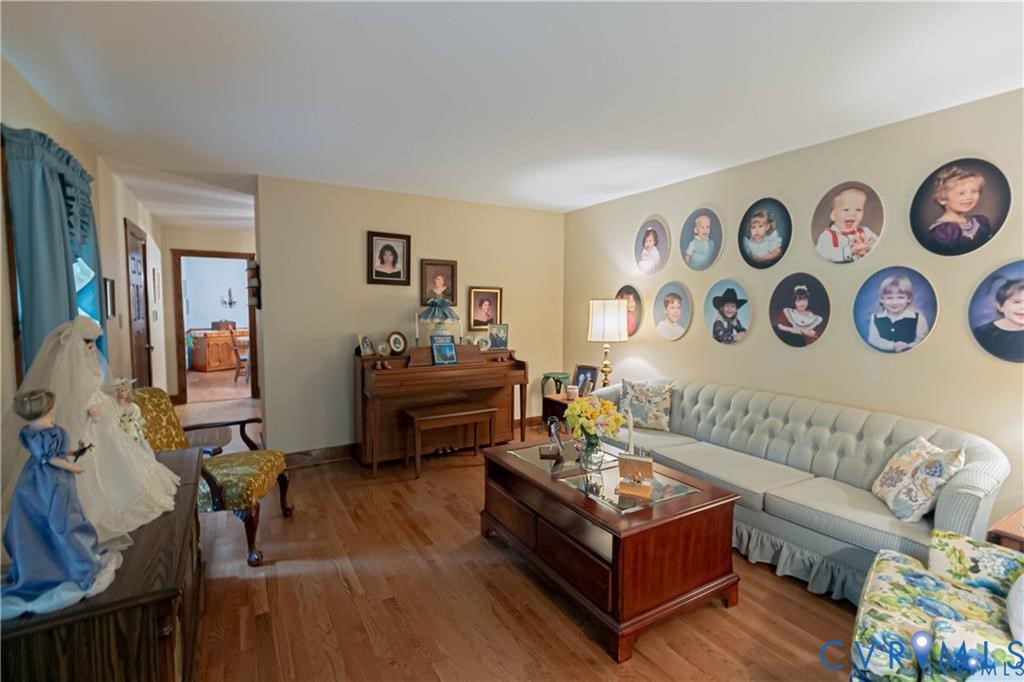 19321 River Road Chesterfield, VA 23838 - Photo 19 of 50 a living room with furniture and wooden floor