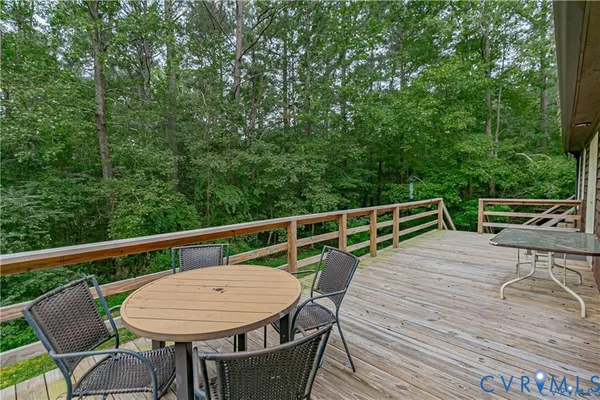 a view of balcony with furniture