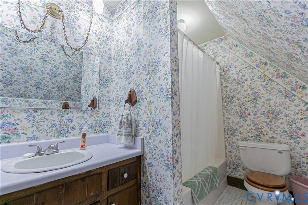 19321 River Road Chesterfield, VA 23838 - Photo 42 of 50 a bathroom with a sink and a mirror