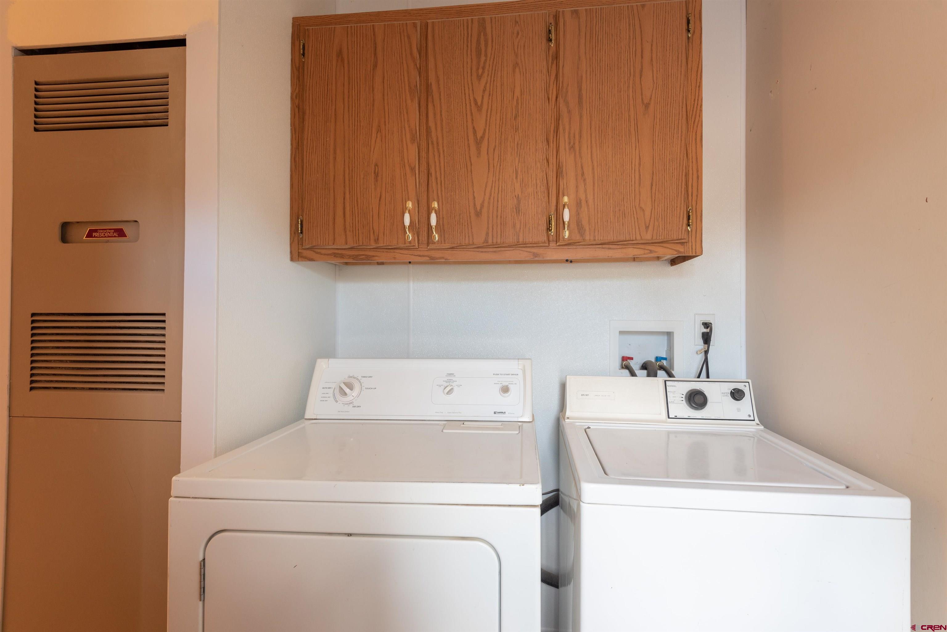 67135 N Road Montrose, CO 81401 - Photo 13 of 35 a utility room with dryer and washer