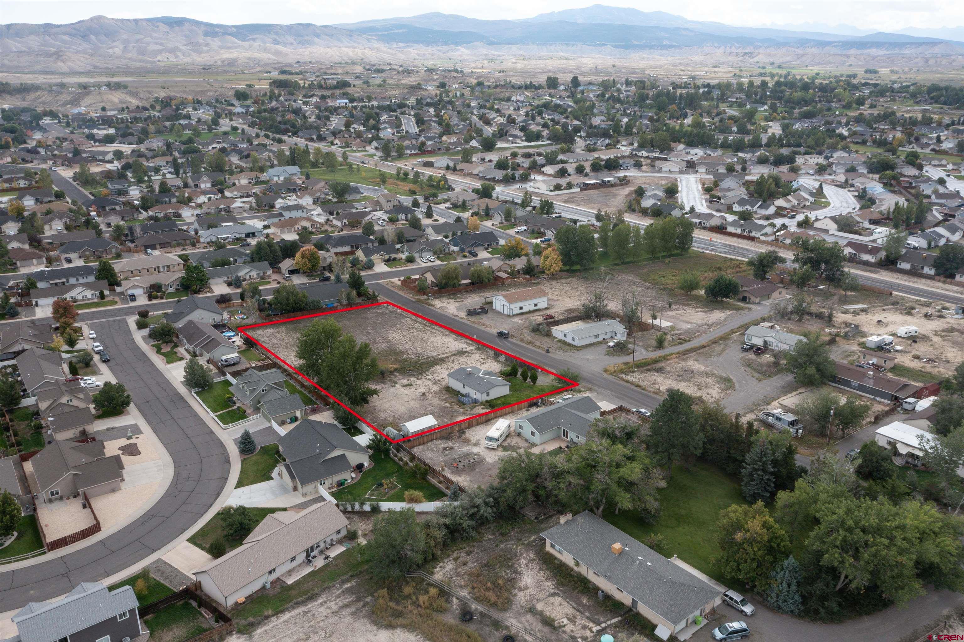 67135 N Road Montrose, CO 81401 - Photo 28 of 35 an aerial view of multiple house
