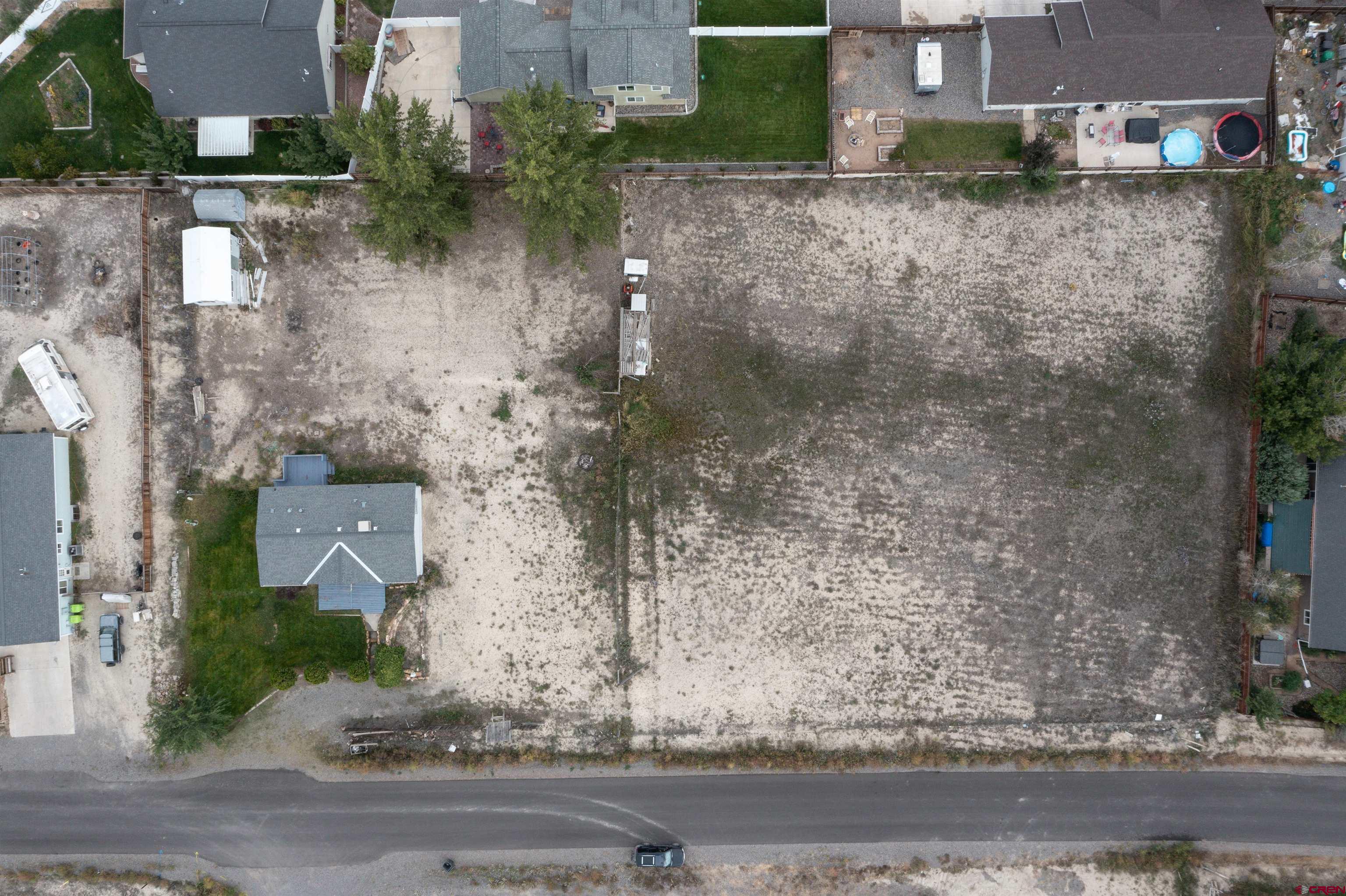 67135 N Road Montrose, CO 81401 - Photo 5 of 35 an aerial view of residential houses with outdoor space
