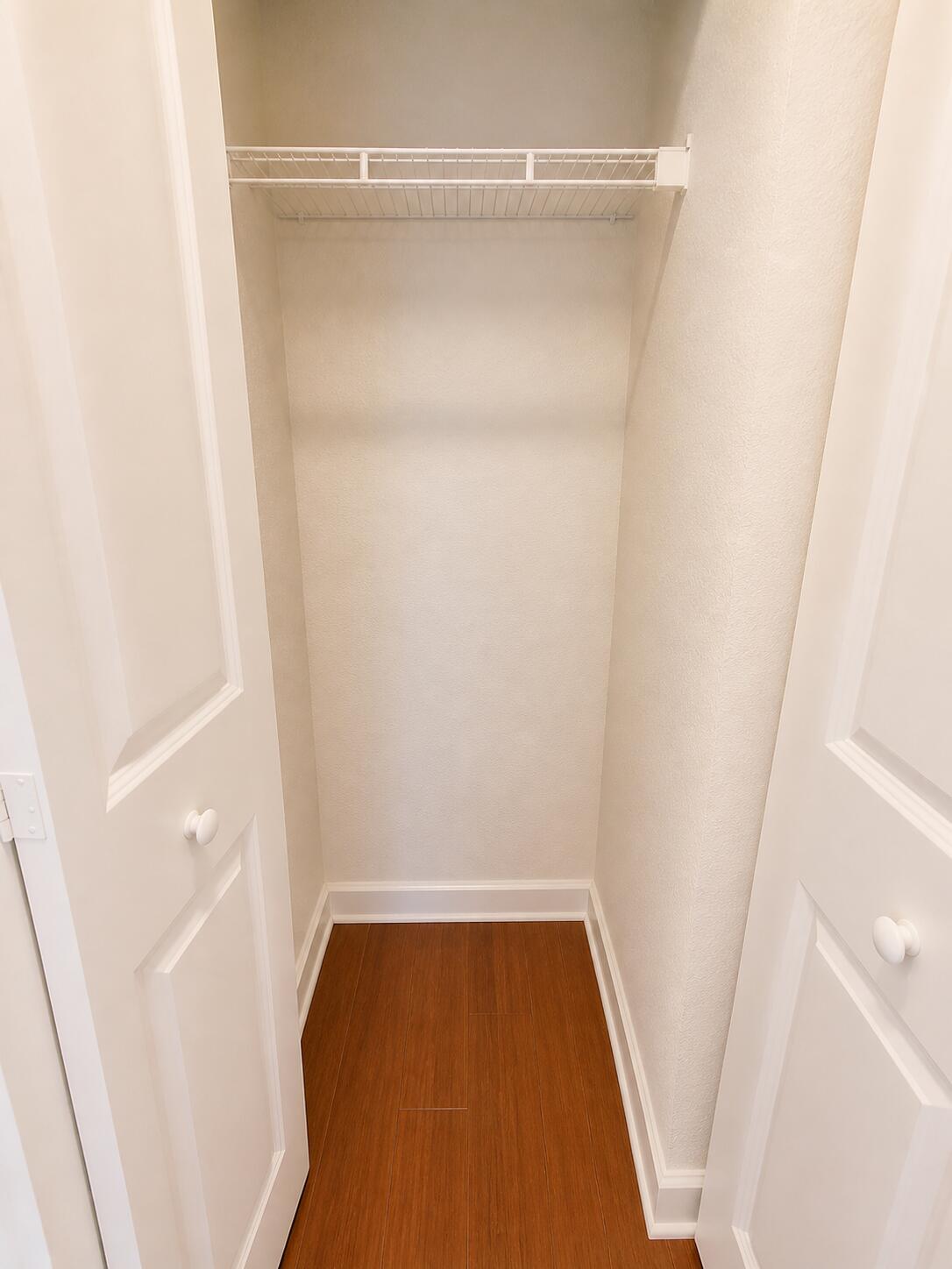 1660 Renaissance Commons Boulevard, Unit 2418 Boynton Beach, FL 33426 - Photo 14 of 18 a bathroom with a glass shower door