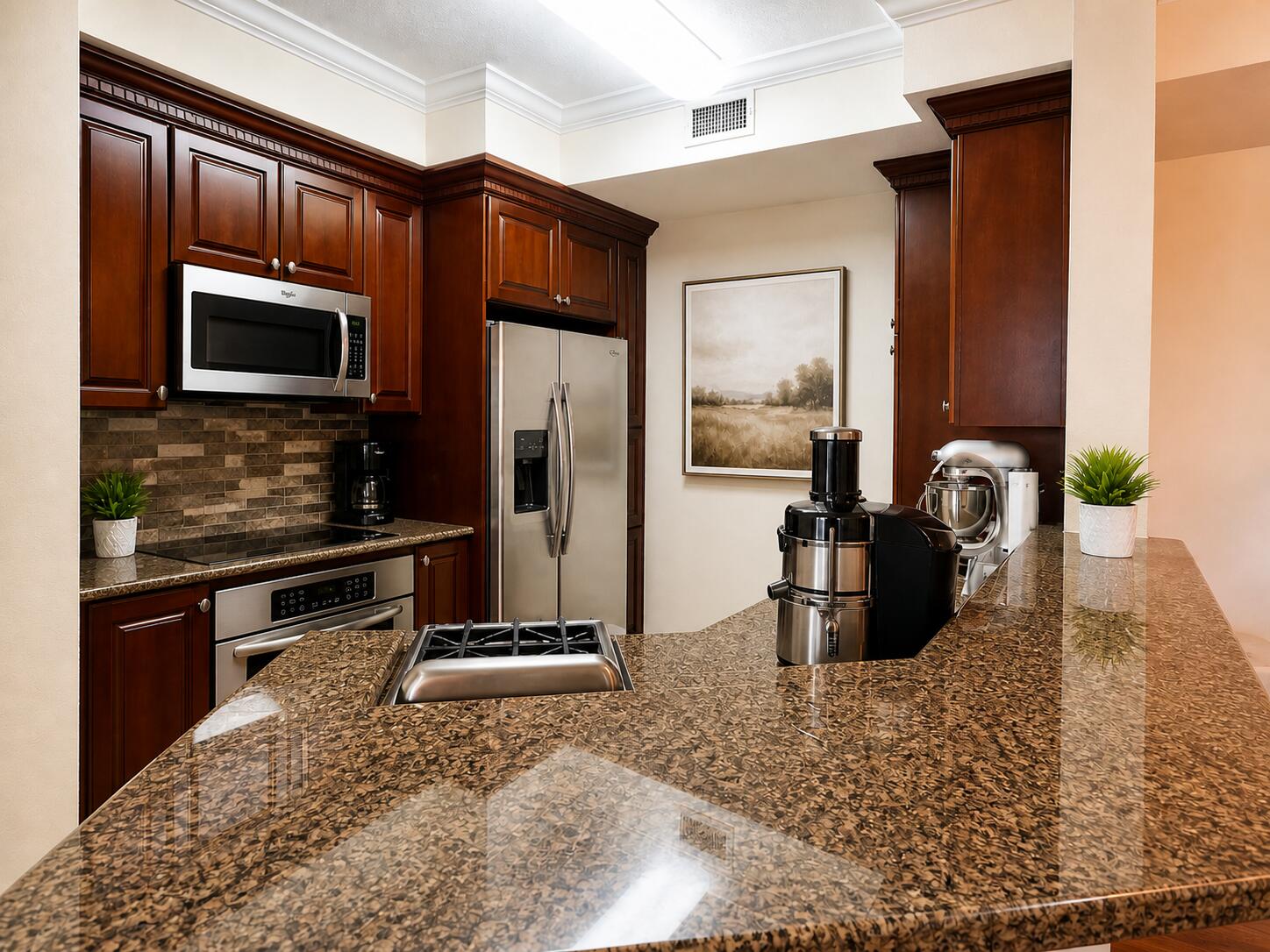 1660 Renaissance Commons Boulevard, Unit 2418 Boynton Beach, FL 33426 - Photo 4 of 18 a kitchen with a refrigerator stove and a sink