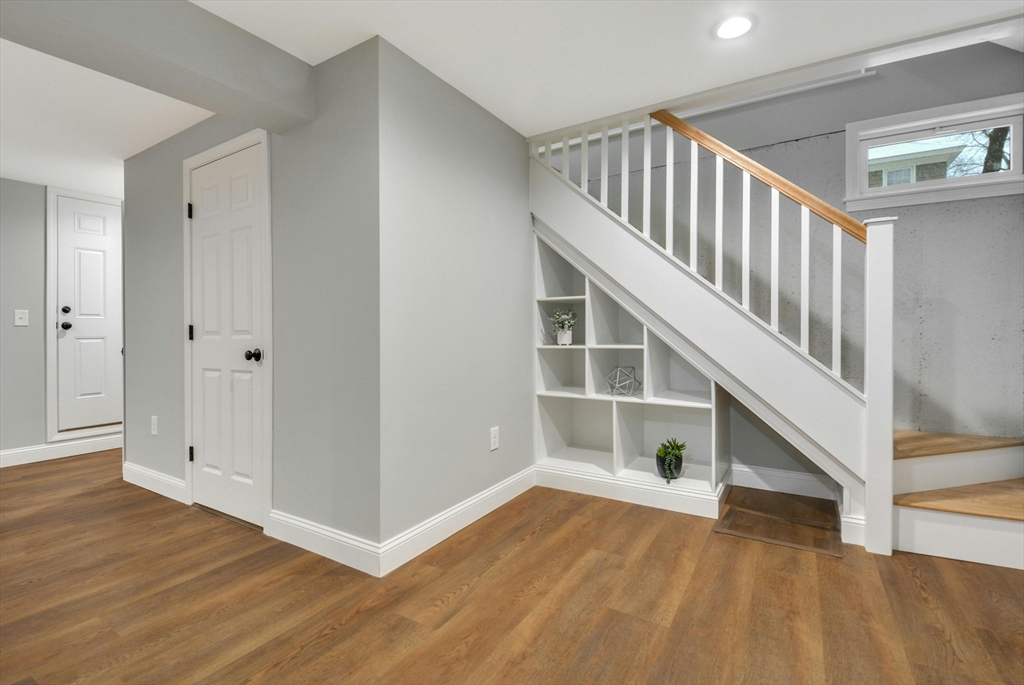 42 Riverside Avenue Concord, MA 01742 - Photo 14 of 21 a view of entryway and hall with wooden floor